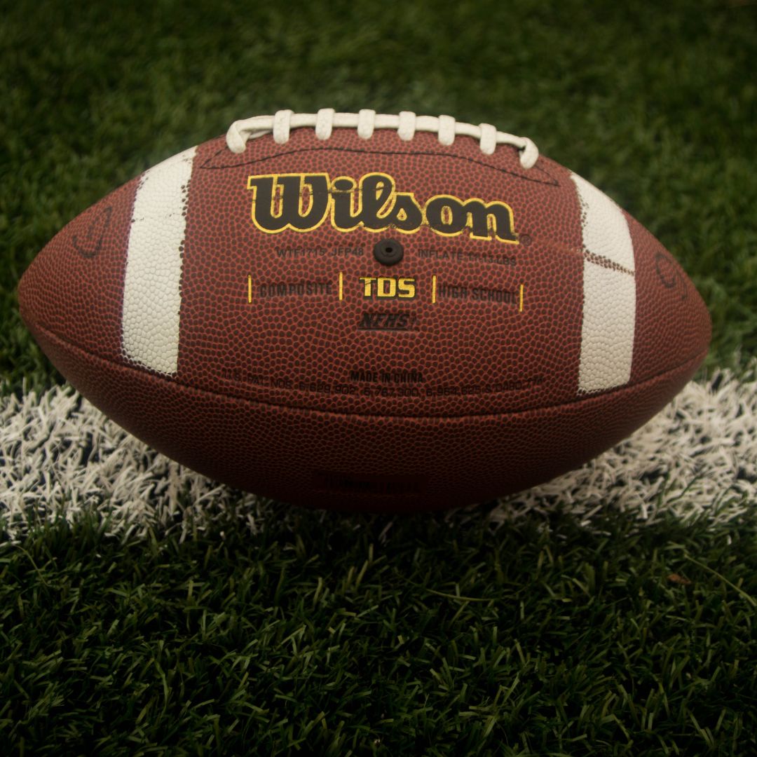 football resting on field